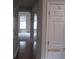 Bright living room featuring hardwood floors, neutral walls, and large windows at 2975 Wintercrest Trce, Dunwoody, GA 30360