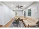 Bright living room with hardwood floors, neutral walls, and a view of the doorway to another room at 86 Stratford Nw Dr, Atlanta, GA 30311