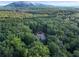 Secluded estate nestled amongst trees, with mountain views and lush surroundings at 1500 Historic Vw, Stone Mountain, GA 30087