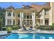 Backyard with swimming pool, patio seating, and views of the home's exterior at 1500 Historic Vw, Stone Mountain, GA 30087