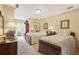 Cozy bedroom featuring two twin beds, dresser and a large window at 1500 Historic Vw, Stone Mountain, GA 30087