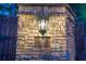 Stone entrance featuring the property address and a vintage-style lantern at 1500 Historic Vw, Stone Mountain, GA 30087
