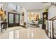 Stunning entryway with grand staircase, high ceilings, and elegant decor at 1500 Historic Vw, Stone Mountain, GA 30087