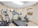 Complete home gym with treadmill, elliptical, and cycling machines, plus a convenient refreshment area at 1500 Historic Vw, Stone Mountain, GA 30087