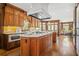 Gourmet kitchen featuring custom cabinets, large island, and stainless steel appliances at 1500 Historic Vw, Stone Mountain, GA 30087