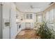 Bright kitchen featuring white cabinets, modern appliances, and a cozy breakfast nook at 1500 Historic Vw, Stone Mountain, GA 30087