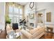 Grand living room with a fireplace, piano, large windows, and high ceilings at 1500 Historic Vw, Stone Mountain, GA 30087