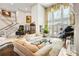 Spacious living room featuring a grand piano and large windows overlooking the backyard at 1500 Historic Vw, Stone Mountain, GA 30087