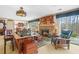 Inviting living room featuring a stone fireplace and cozy seating at 1500 Historic Vw, Stone Mountain, GA 30087