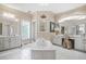 Elegant main bathroom featuring a soaking tub, vanity, and abundant natural light at 1500 Historic Vw, Stone Mountain, GA 30087