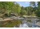 A wooden pavilion on a creek, with a rock bed at 1500 Historic Vw, Stone Mountain, GA 30087