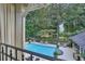 Aerial view of a stunning backyard pool and patio area, perfect for outdoor entertaining at 1500 Historic Vw, Stone Mountain, GA 30087