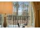 Serene view from balcony overlooking lush greenery and distant mountains at 1500 Historic Vw, Stone Mountain, GA 30087