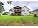 Spacious backyard with a deck, patio, and a well-maintained lawn perfect for outdoor activities at 20 Friendship Rd, Euharlee, GA 30145