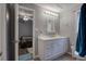 Bathroom with a modern vanity, neutral colors, and a view into the adjacent bedroom at 20 Friendship Rd, Euharlee, GA 30145