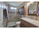Bathroom features a tiled shower, vanity with granite countertop, and modern fixtures at 20 Friendship Rd, Euharlee, GA 30145