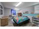Bright bedroom featuring unique décor, wood-look flooring, and a playful atmosphere at 20 Friendship Rd, Euharlee, GA 30145