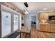 Charming dining area with french doors, built-in shelving, and hardwood floors at 20 Friendship Rd, Euharlee, GA 30145