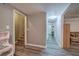 Hallway with access to various rooms, showcasing modern flooring and neutral wall colors at 20 Friendship Rd, Euharlee, GA 30145