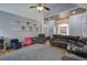 Open living room with a cozy area rug, hardwood floors, and abundant natural light at 20 Friendship Rd, Euharlee, GA 30145