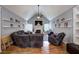 Spacious living room with vaulted ceilings, a fireplace, and hardwood floors, perfect for relaxation at 20 Friendship Rd, Euharlee, GA 30145