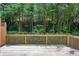 View of a backyard deck with lush green trees that provides a scenic view at 2774 Birch Grove Se Ln # 11, Marietta, GA 30067