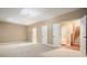 Spacious basement featuring carpet and an open staircase at 2774 Birch Grove Se Ln # 11, Marietta, GA 30067