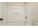 Clean white bathroom featuring a tub with showerhead at 2774 Birch Grove Se Ln # 11, Marietta, GA 30067