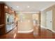 A kitchen with stainless steel appliances, wood cabinets, and a bar that overlooks the rest of the home at 2774 Birch Grove Se Ln # 11, Marietta, GA 30067