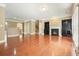 A living room with a bar that overlooks the kitchen, a fireplace, and stairs leading to a second floor at 2774 Birch Grove Se Ln # 11, Marietta, GA 30067