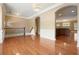 Elegant living room featuring hardwood floors, white trim, and an open archway to the kitchen at 2774 Birch Grove Se Ln # 11, Marietta, GA 30067