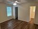 Comfortable bedroom with two entryways, neutral walls and flooring, and a window at 504 Edgewood Trce, Mcdonough, GA 30253