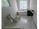 Bathroom featuring a contemporary tub and modern vanity, showcasing design at 854 Mcdonough Se Blvd, Atlanta, GA 30315