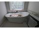 Bathroom showcasing modern freestanding tub and great natural light at 854 Mcdonough Se Blvd, Atlanta, GA 30315