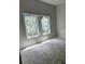 A bright bedroom with windows providing a view of the outdoors at 854 Mcdonough Se Blvd, Atlanta, GA 30315