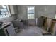 Close up of unfinished cabinets and windows in the kitchen at 854 Mcdonough Se Blvd, Atlanta, GA 30315