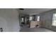 Unfinished living room showing drywall, concrete floor, and windows at 854 Mcdonough Se Blvd, Atlanta, GA 30315