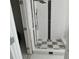 Modern shower featuring black and white tiles and a rain shower head at 854 Mcdonough Se Blvd, Atlanta, GA 30315