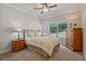 Cozy bedroom with carpeted floors, natural light, and tasteful decor at 902 Edgewater Dr, Loganville, GA 30052