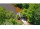 Overhead view of a private dock surrounded by dense trees and water, offering a secluded retreat at 902 Edgewater Dr, Loganville, GA 30052