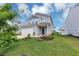 Charming two-story home featuring a two car garage, inviting curb appeal, and well manicured landscaping at 109 Paulownia Cir, Mcdonough, GA 30253