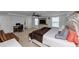 Spacious main bedroom features a ceiling fan, and a cozy seating area, offering comfort and style at 109 Paulownia Cir, Mcdonough, GA 30253