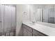 Clean and modern bathroom with a vanity, large mirror, and shower with white tile and a white shower curtain at 319 Hayden Cir, Woodstock, GA 30189