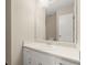 Bathroom featuring a vanity with storage and a well-lit mirror at 4039 Tanglewood Rd, Snellville, GA 30039