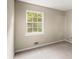 Bedroom with neutral carpet, natural light, and a window at 4039 Tanglewood Rd, Snellville, GA 30039