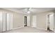 Bedroom offering dual closets, carpeted floors, and entryways to other rooms at 4039 Tanglewood Rd, Snellville, GA 30039