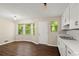 Updated kitchen offers ample natural light and vinyl flooring at 4039 Tanglewood Rd, Snellville, GA 30039