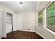 Bright laundry area with a washer and dryer, and natural light from the windows at 4039 Tanglewood Rd, Snellville, GA 30039