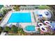 Aerial view of the community pool area featuring a waterslide and kiddie splash area at 1635 Lake Heights Cir, Dacula, GA 30019