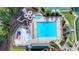Aerial view of community pool area with splash pad, waterslide and ample seating at 1635 Lake Heights Cir, Dacula, GA 30019